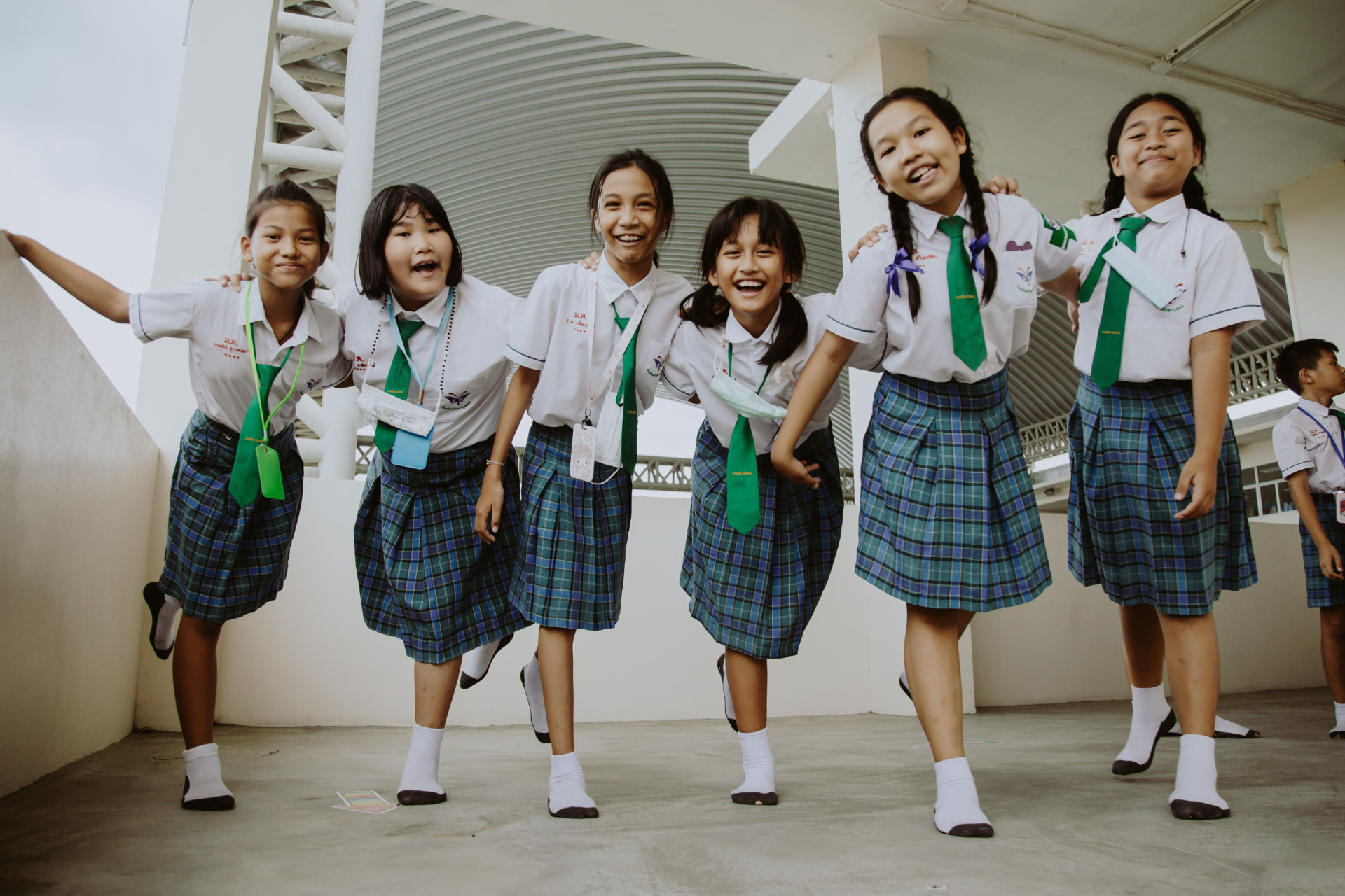Smiling students in school uniforms
